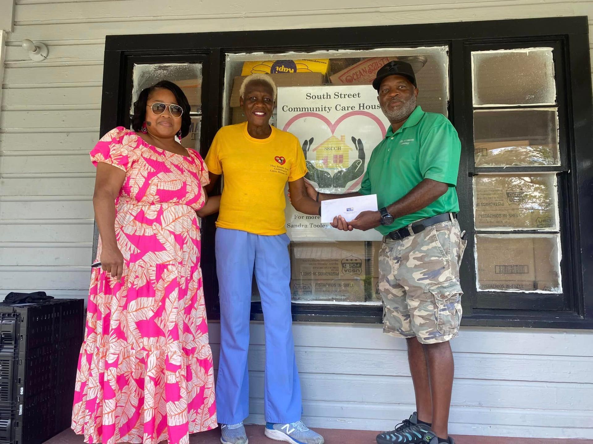 Community partners delivering a donation